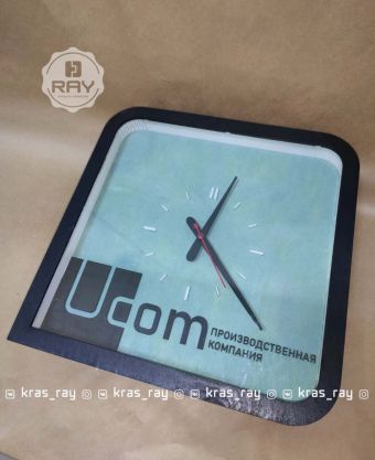 Корпоративные часы в фирменном стиле компании Ucom